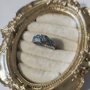 Ring. Silver Tone Blue & Clear Love Knot Crystals "I Love You" engraved.  Sz 6